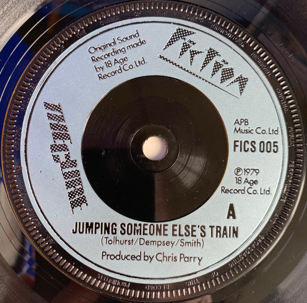 The Cure : Jumping Someone Else's Train (7", Single, Blu)